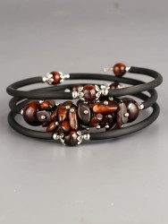 Браслет из бычьего глаза "Мелодия" 02-1105